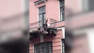 WCGW chilling on an unstable balcony