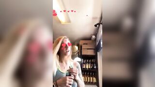 Bikini Barista flashing a customer