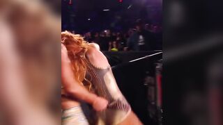 Charlotte Flair gives Becky Lynch a wedgie